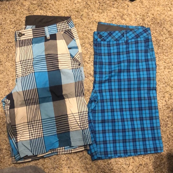 2 pairs of men shorts lululemon and under Armour